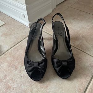 Black bow heels